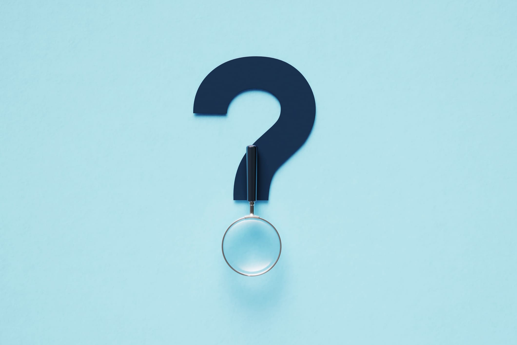 Magnifier Forming A Question Mark On Blue Background